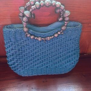 Elegant Blue Woven Satchel with Decorative Handle